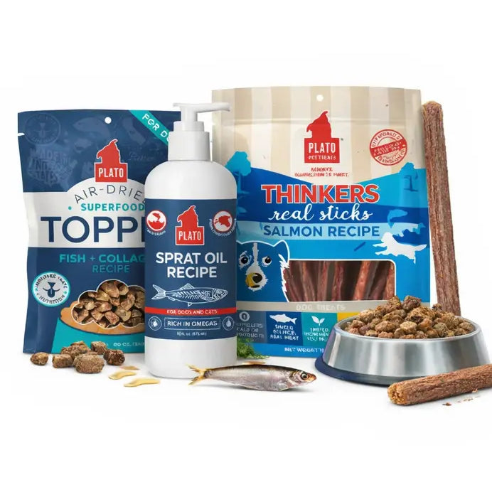 Collection of Plato pet products including treats, oil, and sticks on a white background